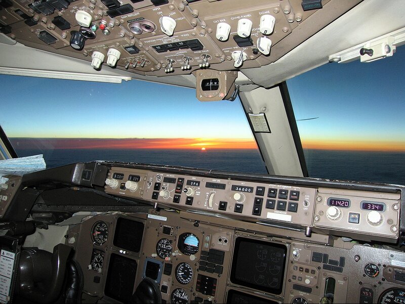 Cockpit view of sunset over ocean