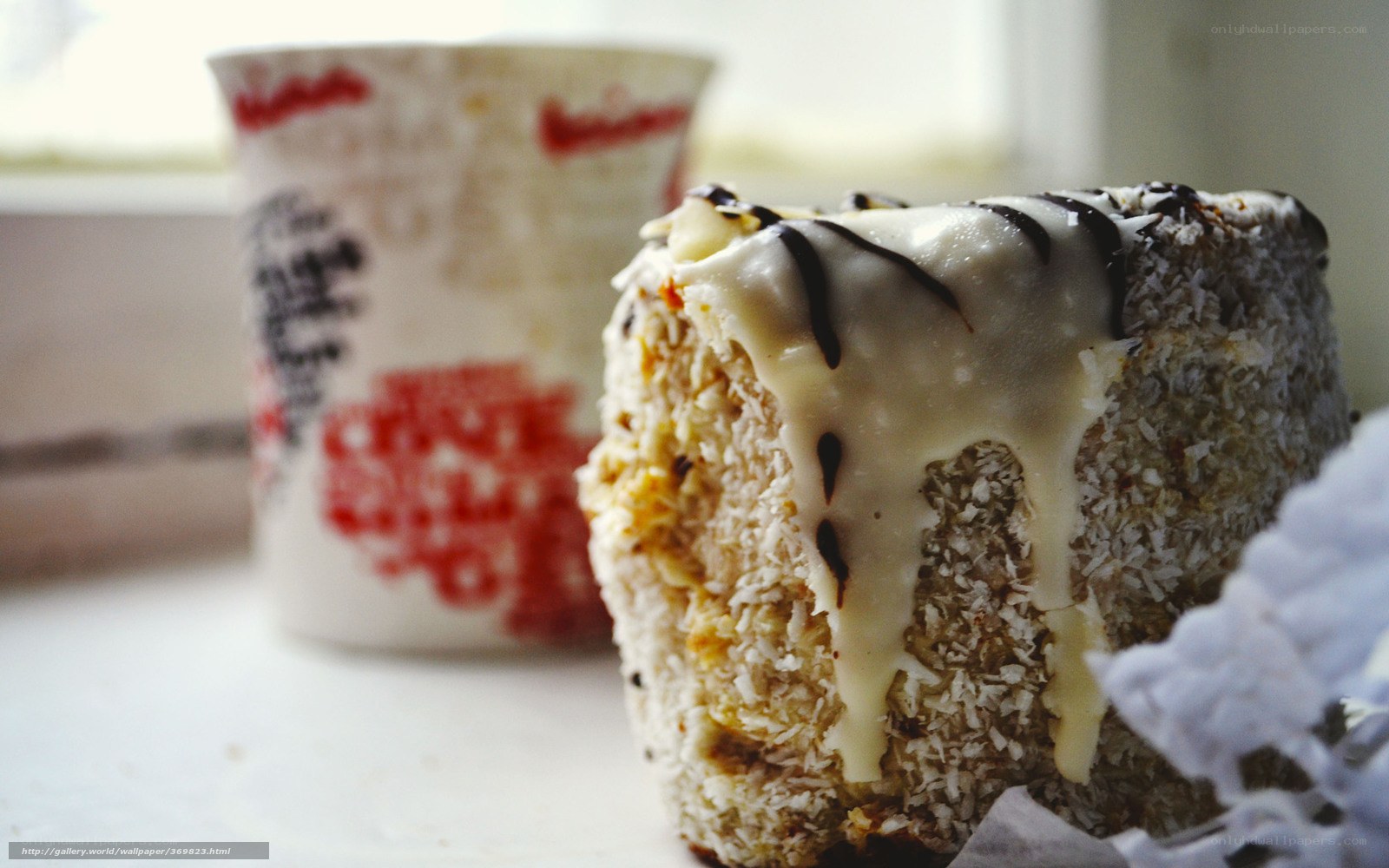 coconut cake with chocolate drizzle