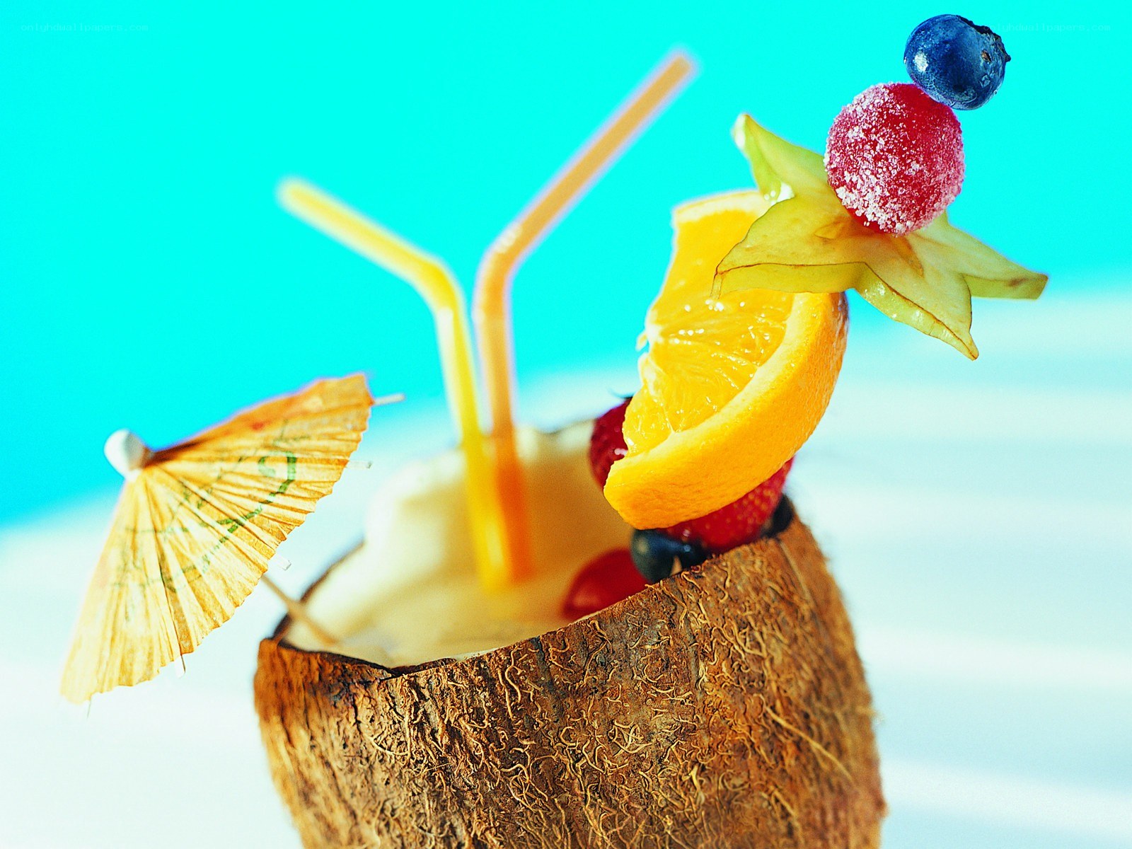 coconut drink with fruit garnish