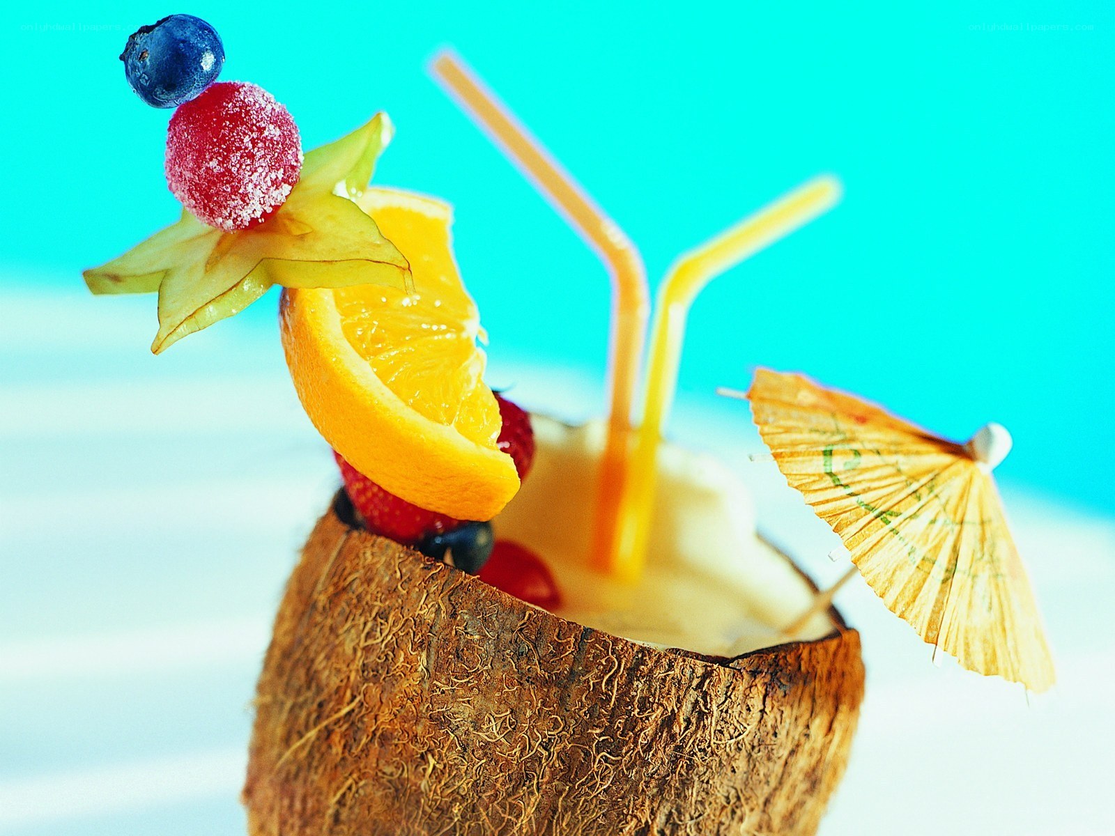 coconut drink with fruit garnish