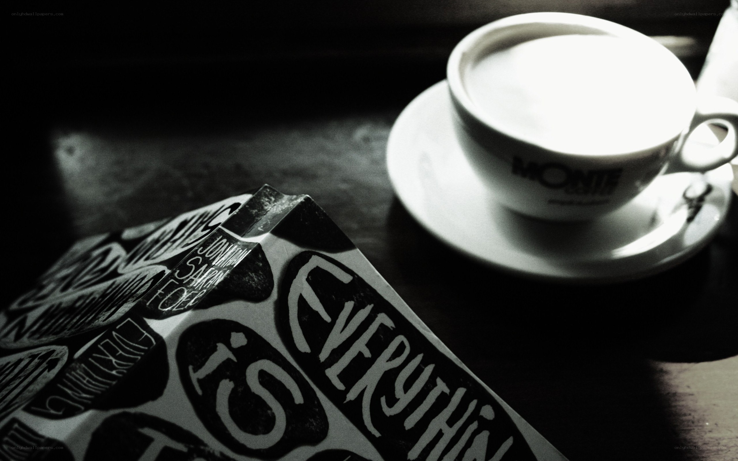 coffee and book on table