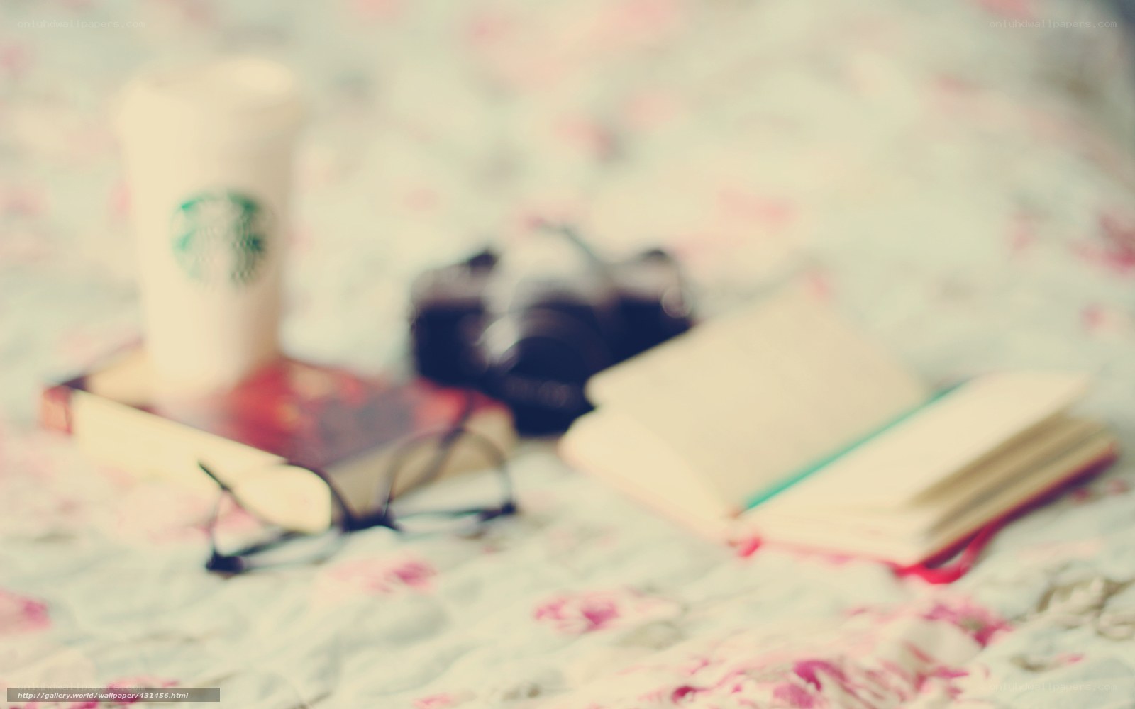 Coffee and books on bed