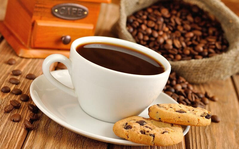coffee and cookies on wood