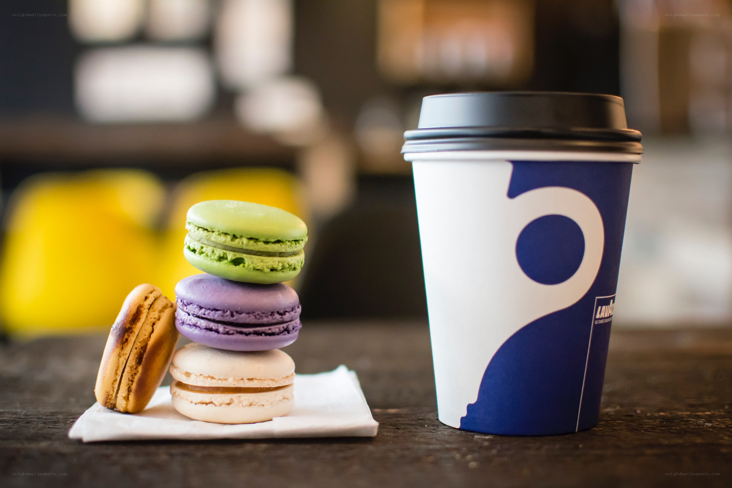 Coffee and macarons on a table