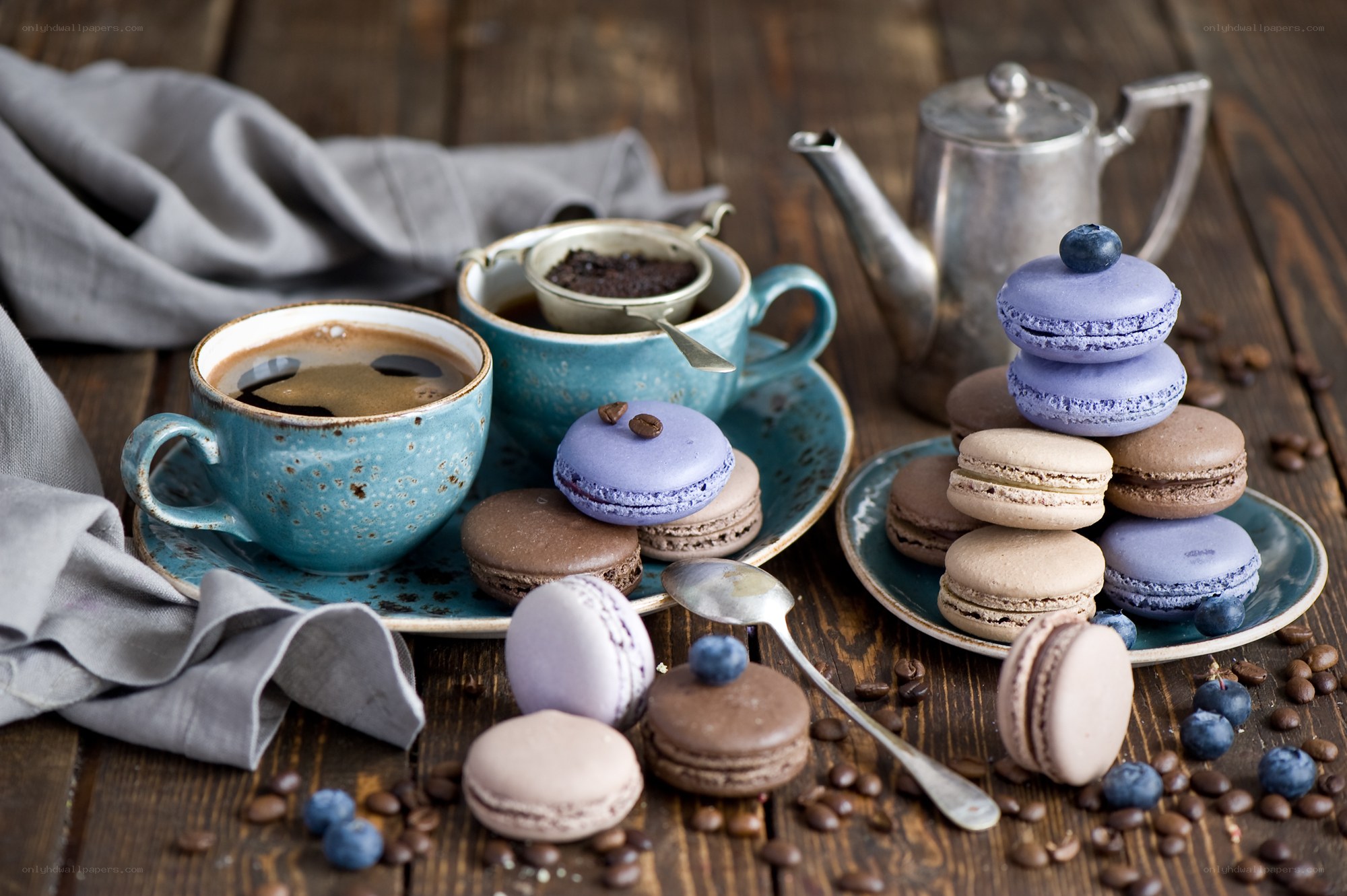 Coffee and macarons on wood