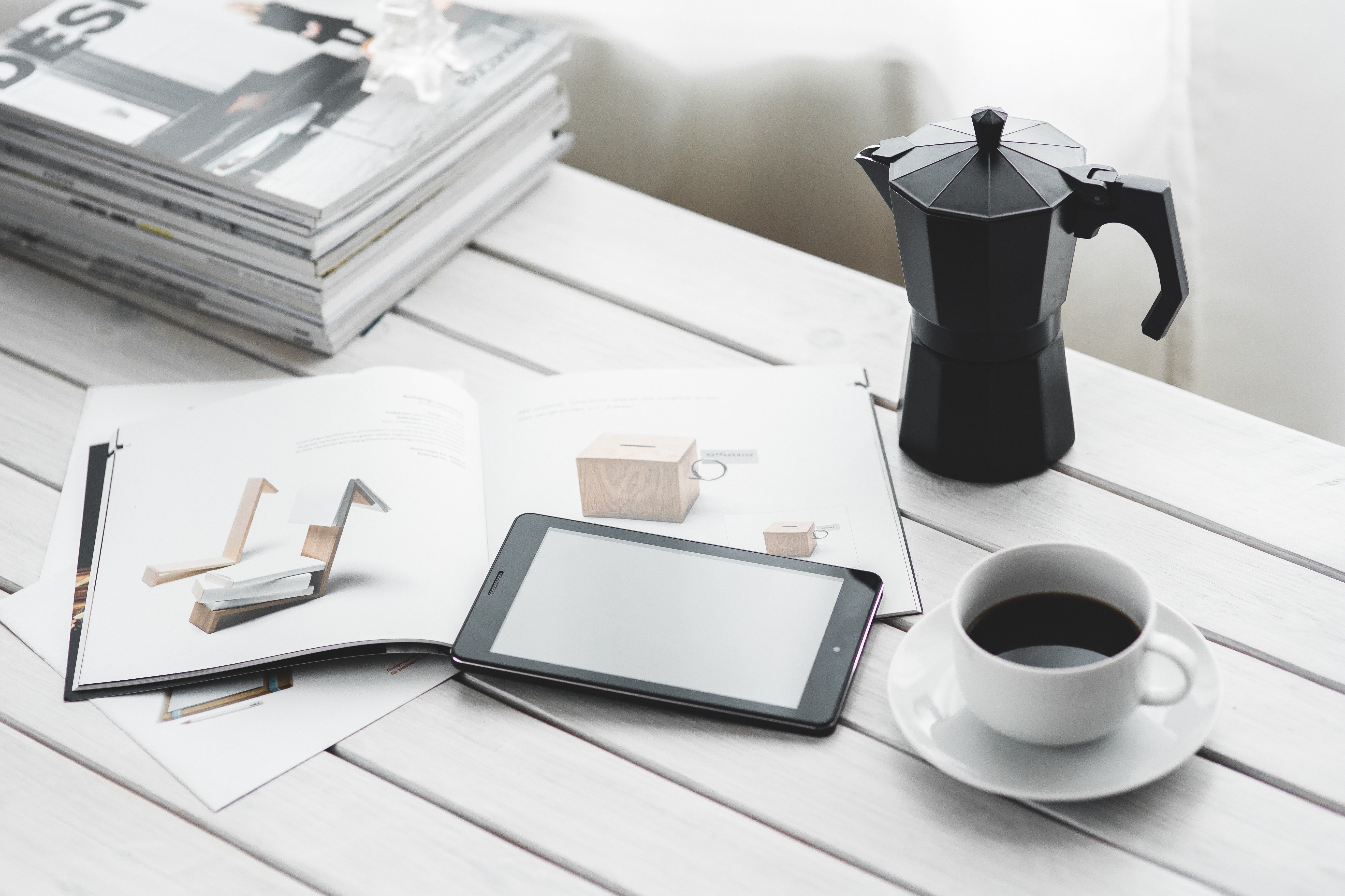 Coffee and magazine on table