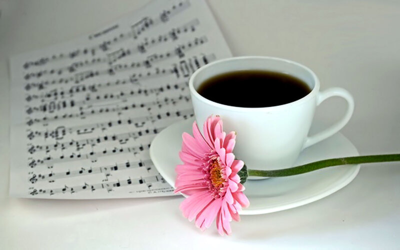 coffee and music sheet with flower