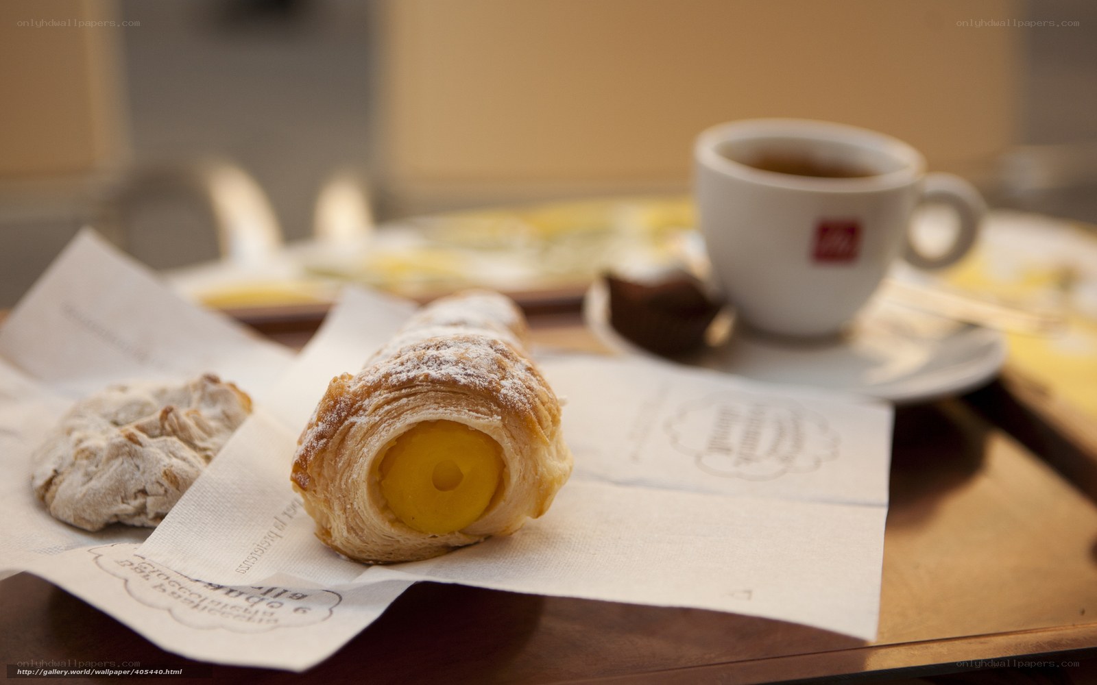 coffee and pastries on a tray