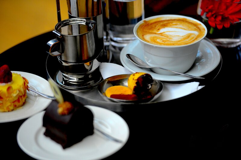 Coffee and Pastries on Table — White