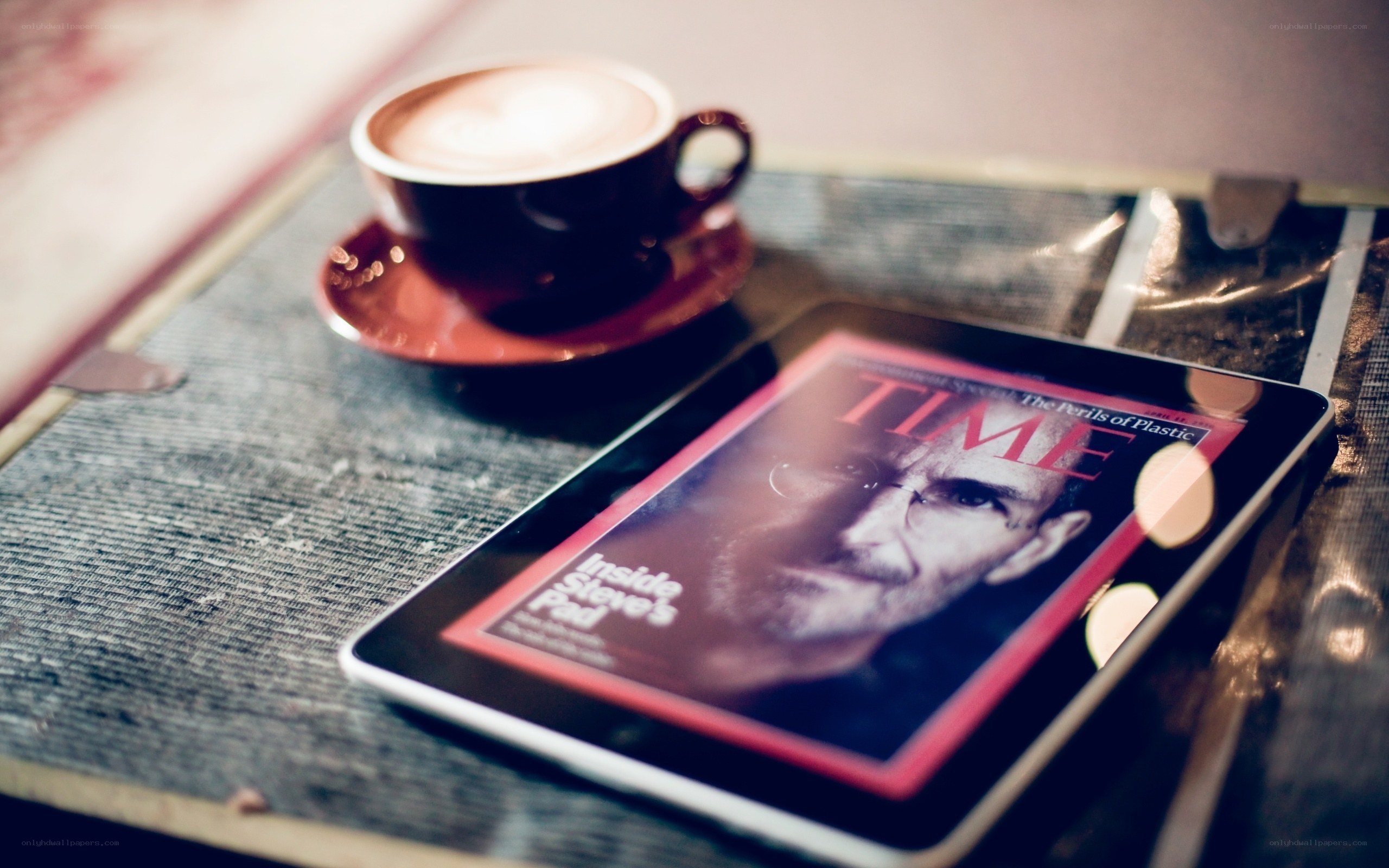 coffee and tablet on table