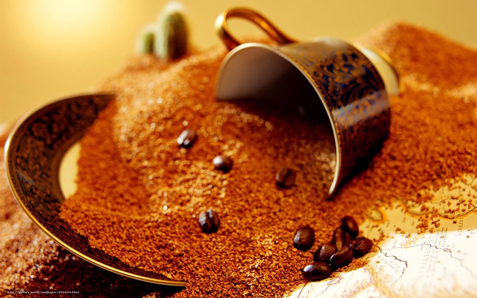 coffee beans and cup on map