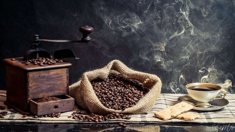 Coffee beans and grinder