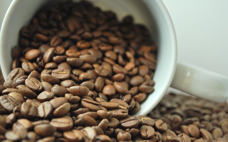 Coffee Beans in a Cup — Brown