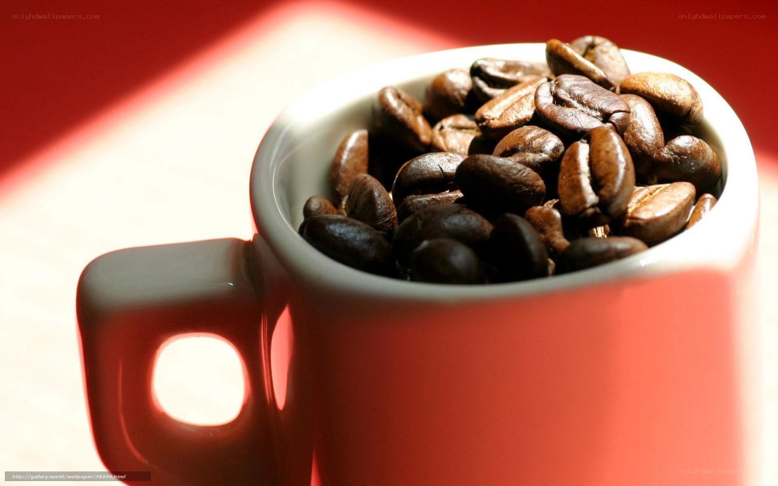 coffee beans in a red mug