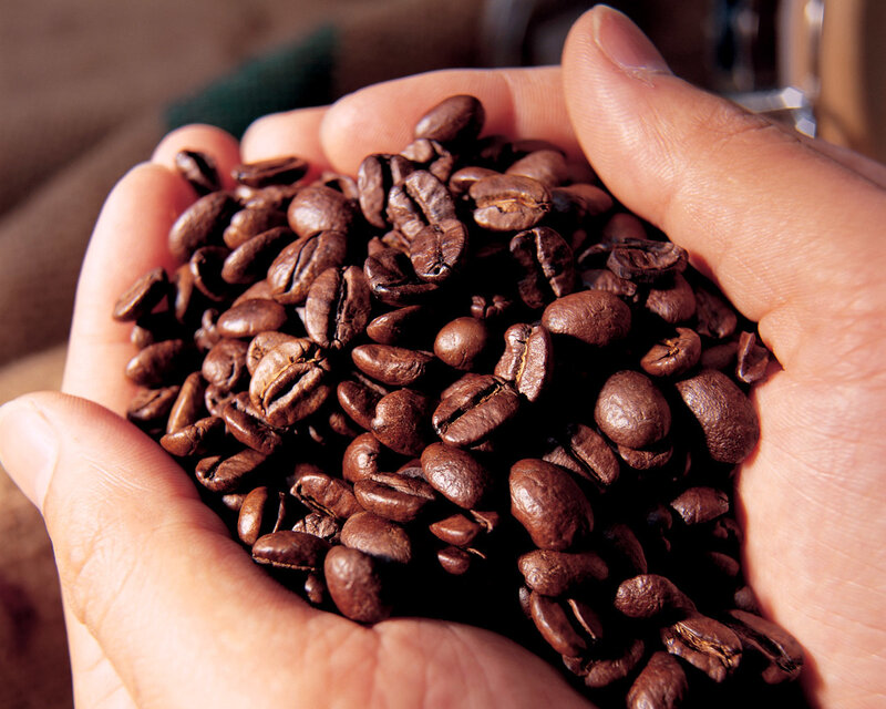 Coffee Beans in Hand