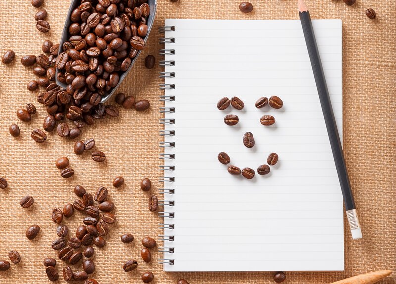 Coffee Beans on Notebook