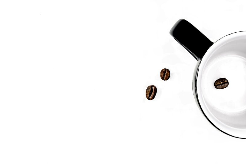 Coffee Beans on White Surface — Minimalist