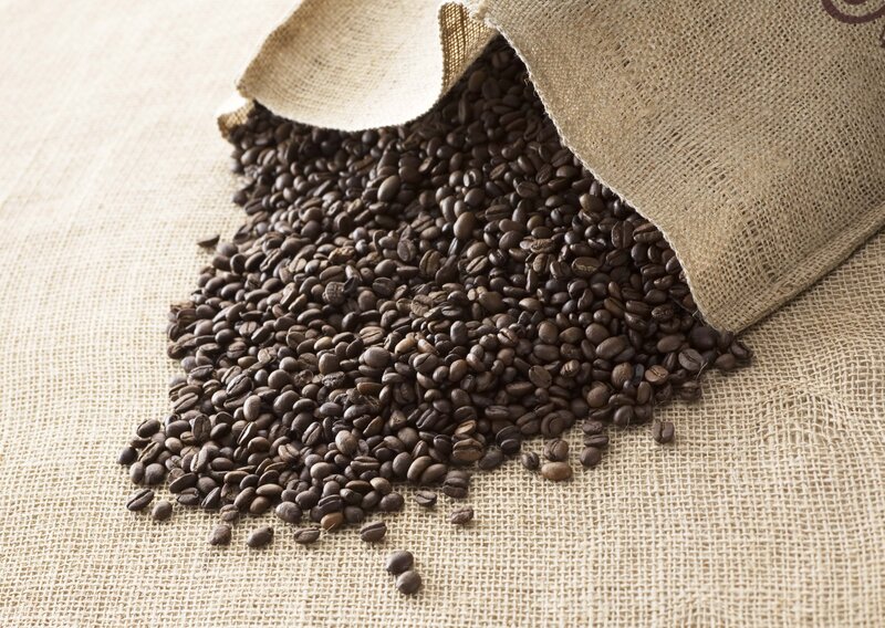 coffee beans spilling from burlap sack