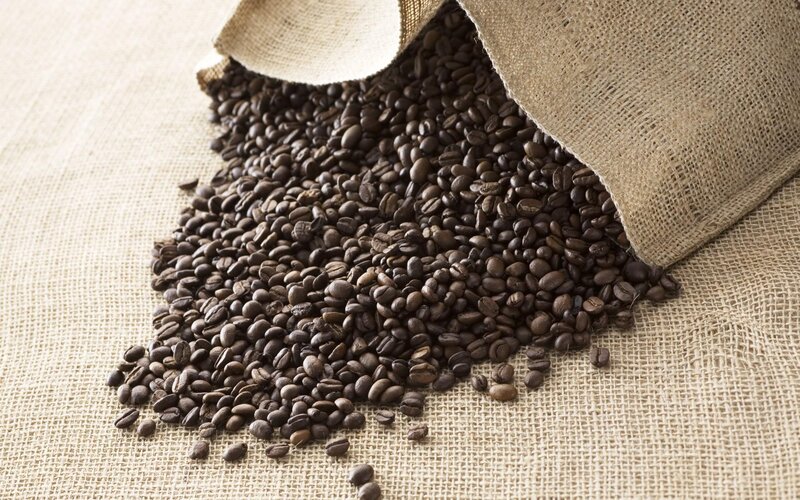 coffee beans spilling from sack