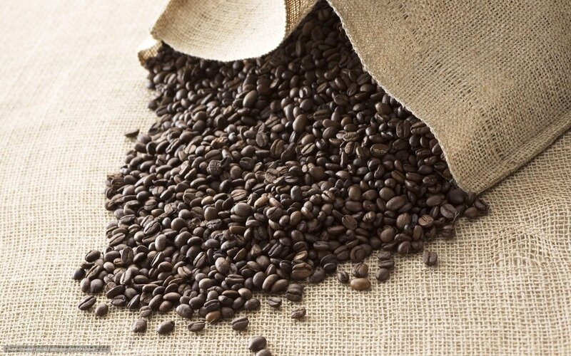 coffee beans spilling from sack