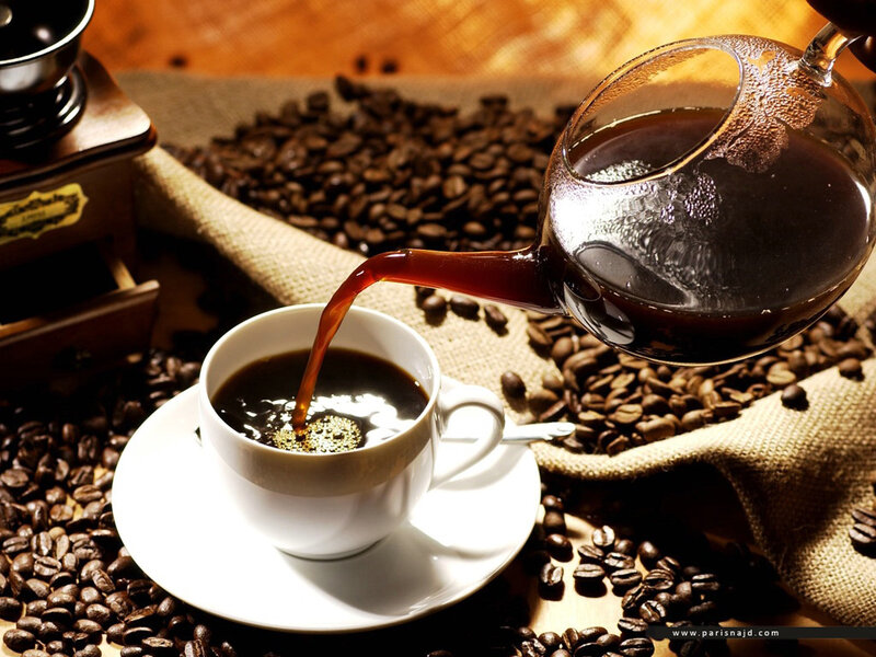 coffee being poured into a cup