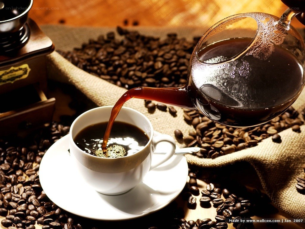 coffee being poured into a cup