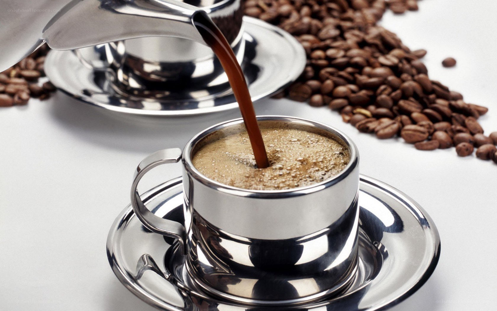 coffee being poured into cup