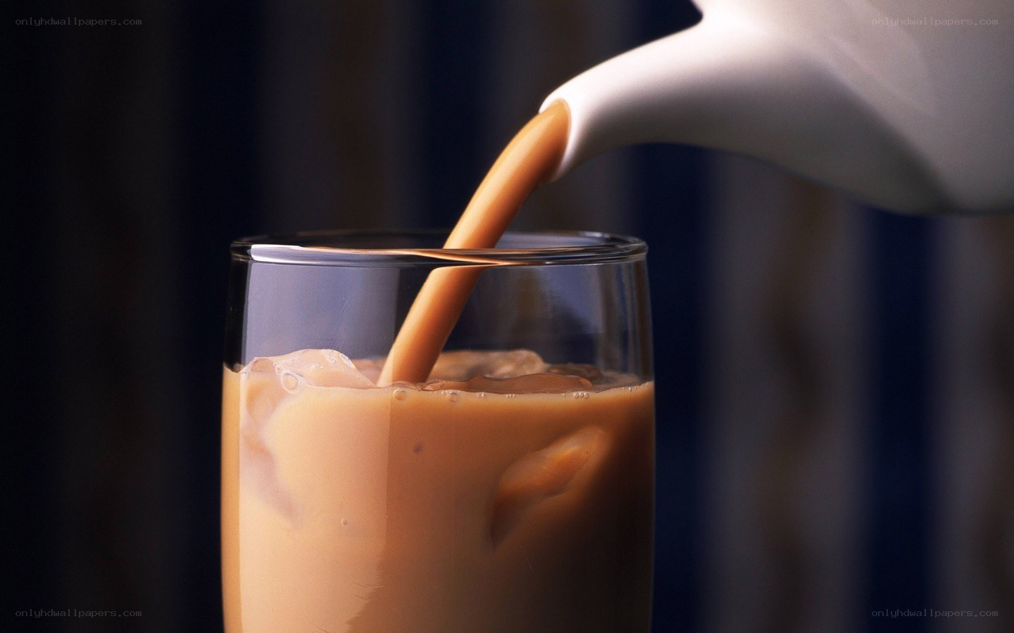 coffee being poured into glass