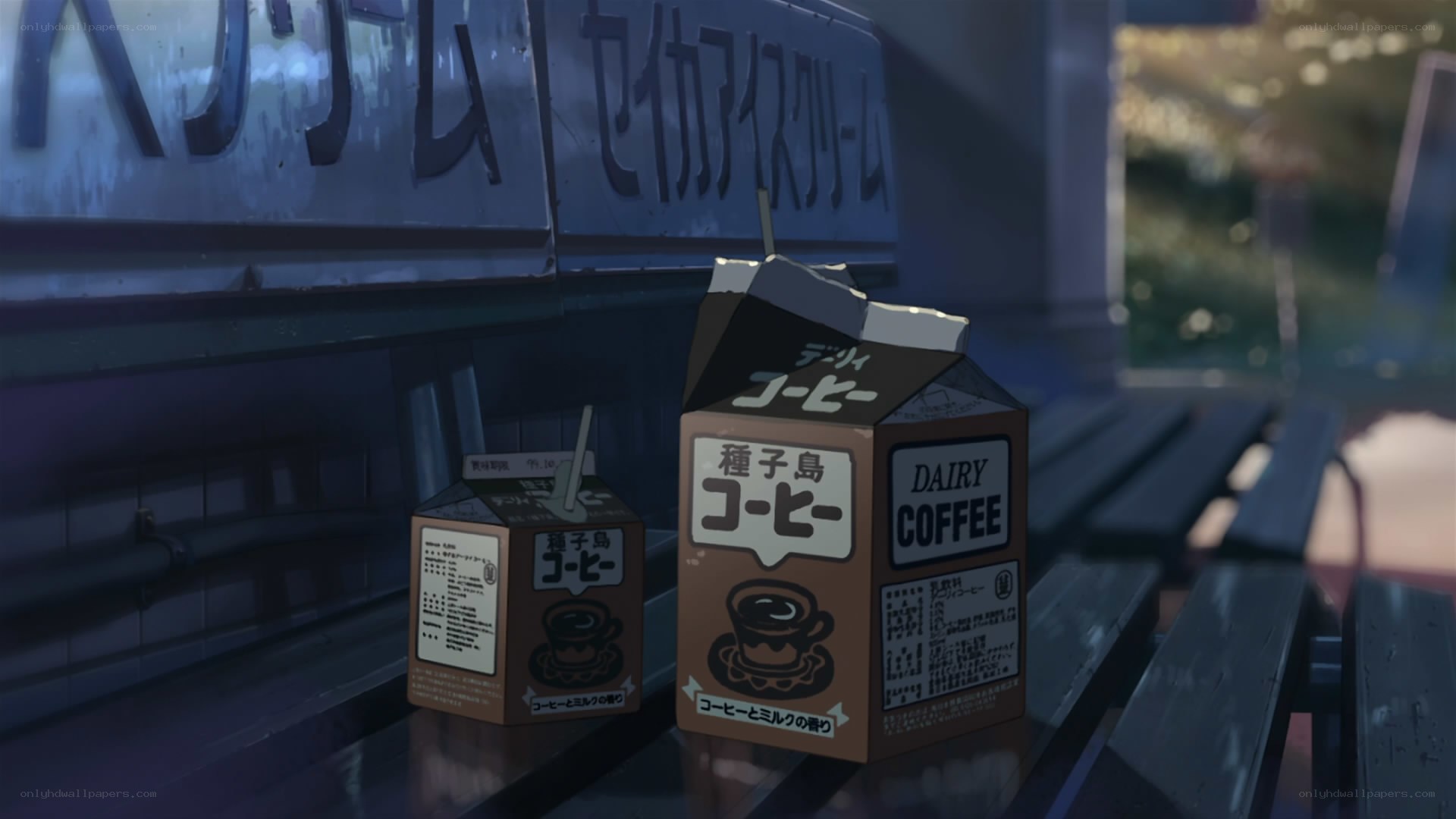 Coffee cartons on a bench