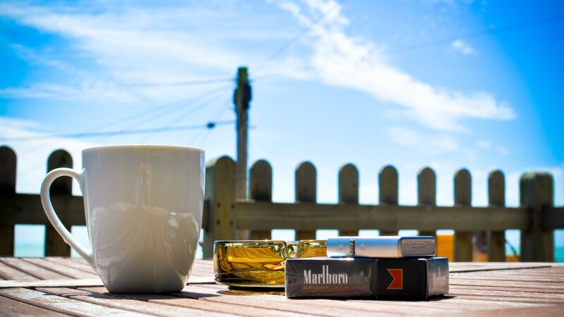 Coffee Cup and Cigarettes