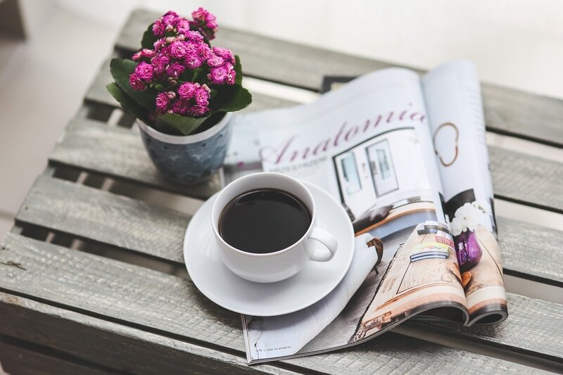 Coffee Cup and Magazine