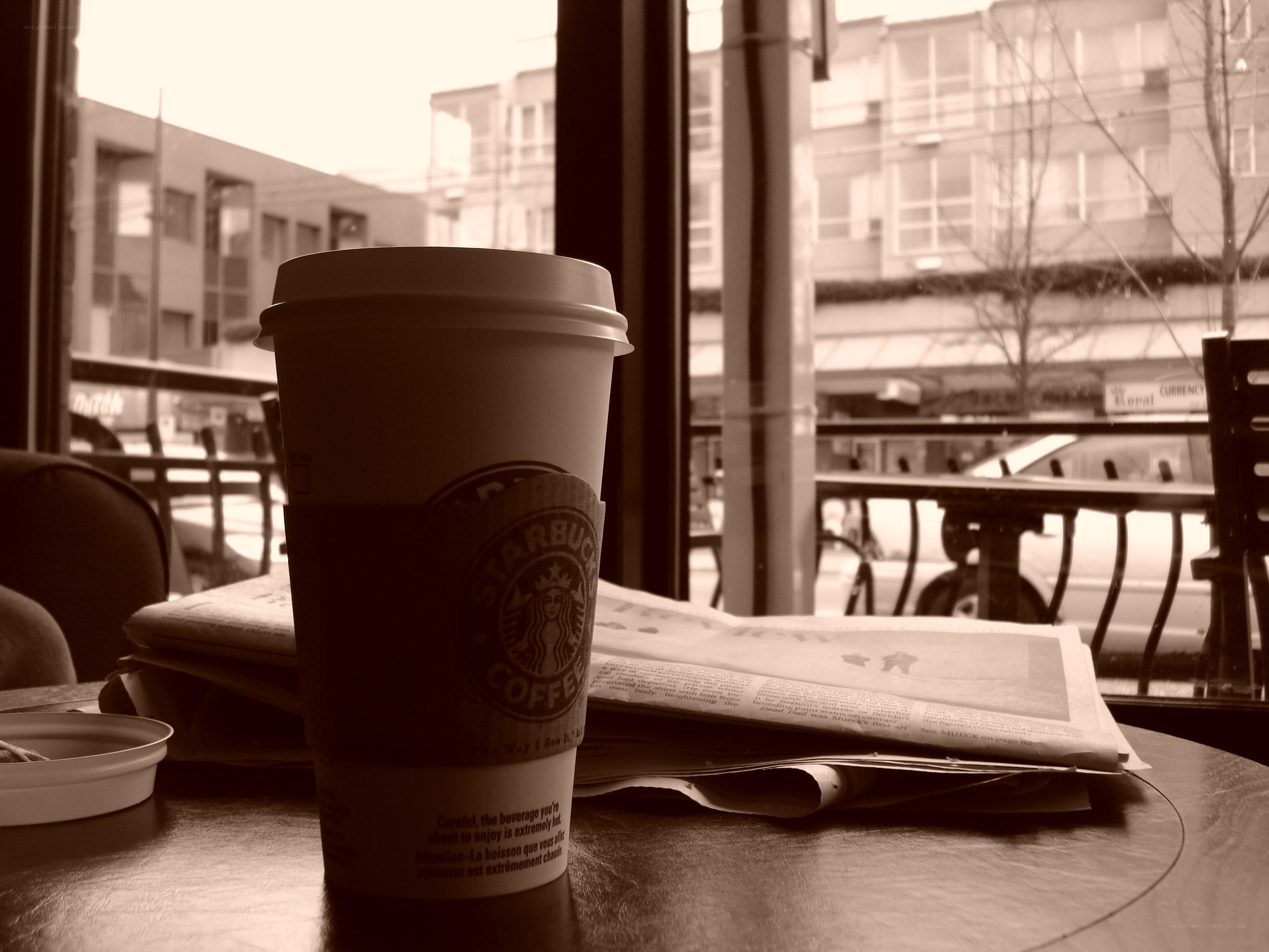 Coffee cup by window