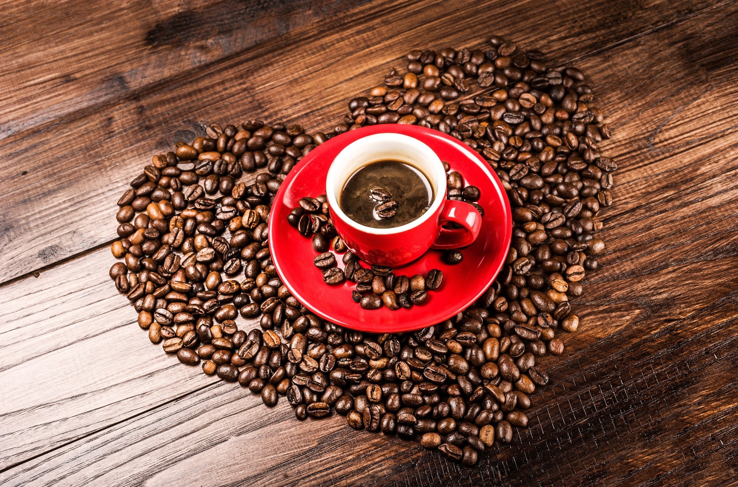 coffee cup in coffee bean heart