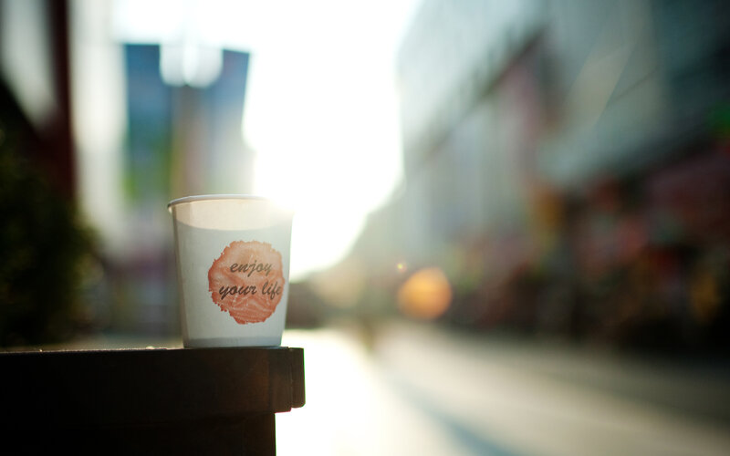 coffee cup on a city street