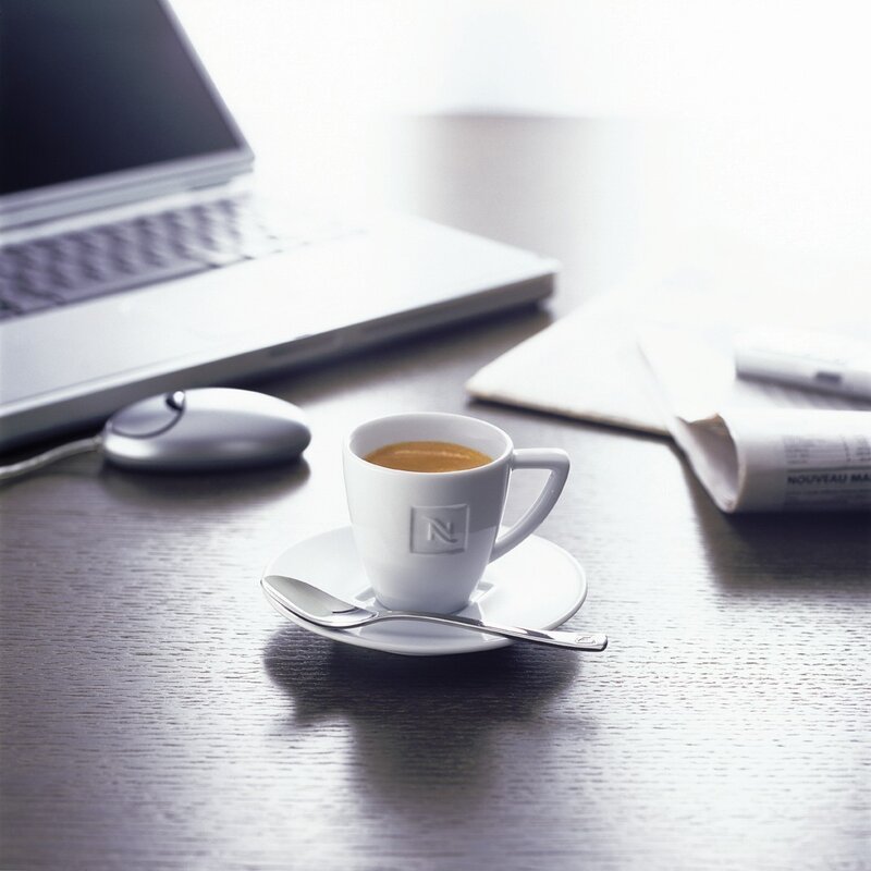 Coffee cup on a desk