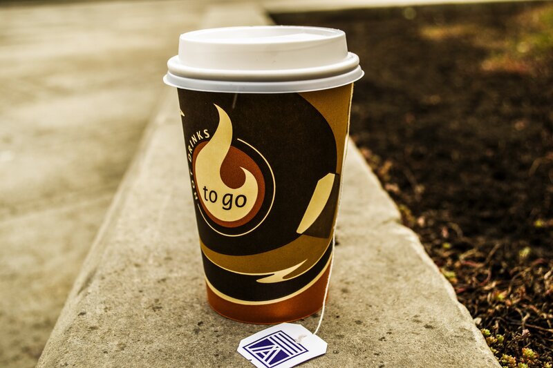 Coffee cup on a stone ledge