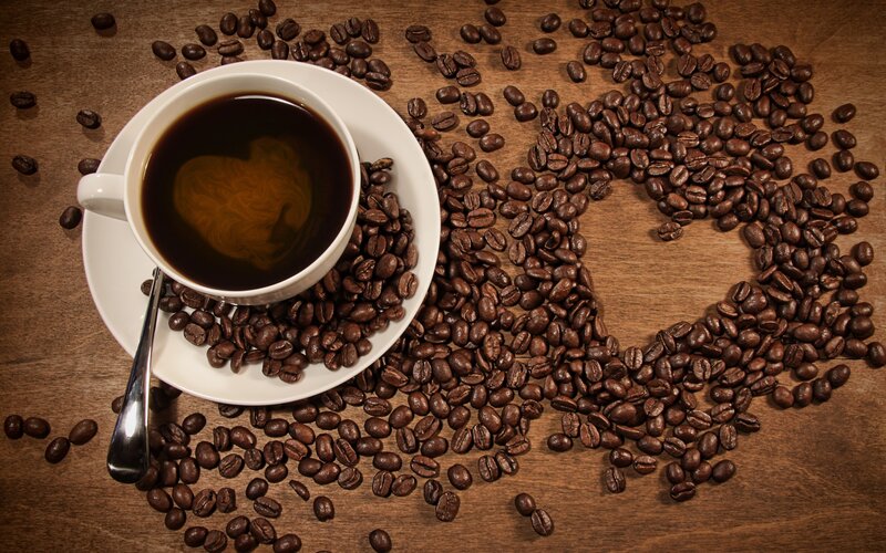 Coffee Cup on Beans — Brown, Calm, Photograph, Coffee Beans, Saucer, Spoon, White