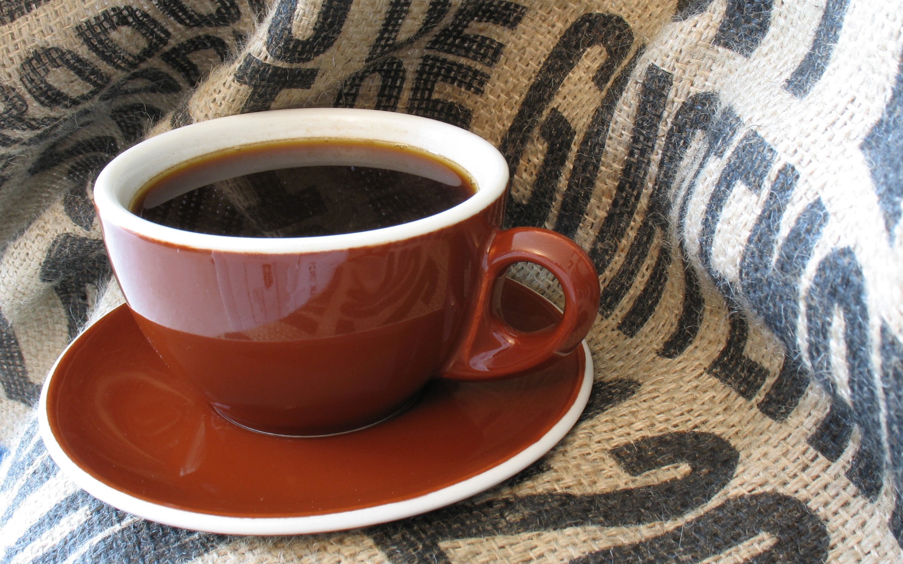 coffee cup on burlap sack