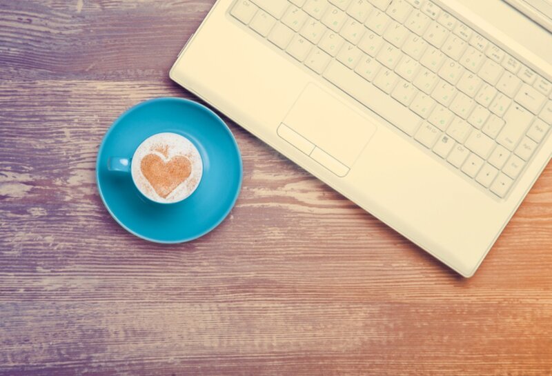 Coffee Cup on Laptop — Blue