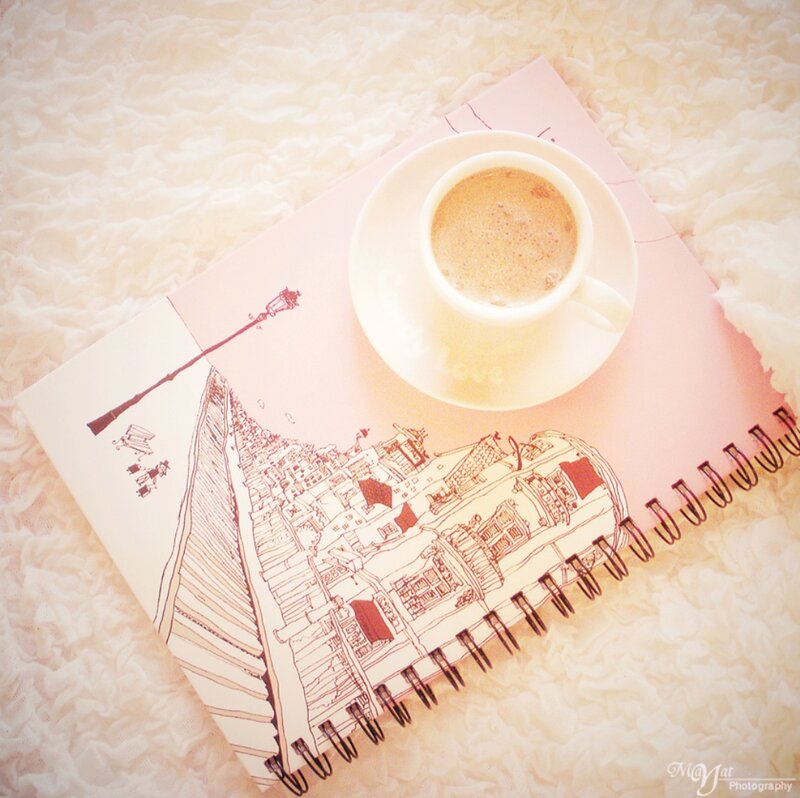 Coffee Cup on Notebook