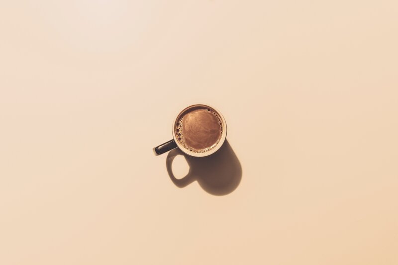 Coffee Cup on Table — Beige