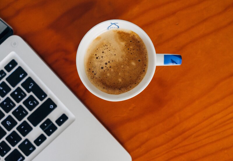 Coffee Cup on Table — Brown, Calm, Photograph, Laptop