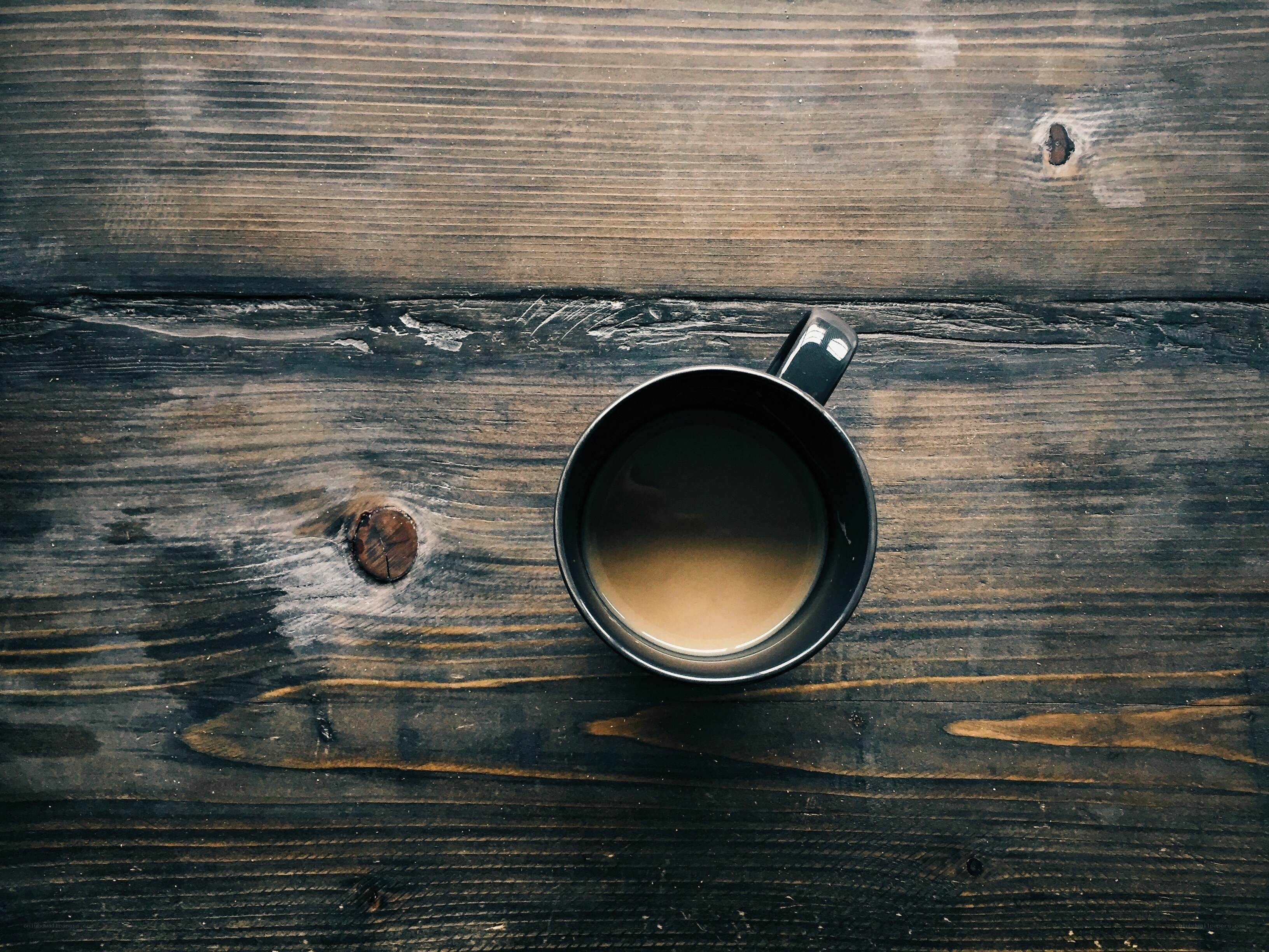 coffee cup on wooden table