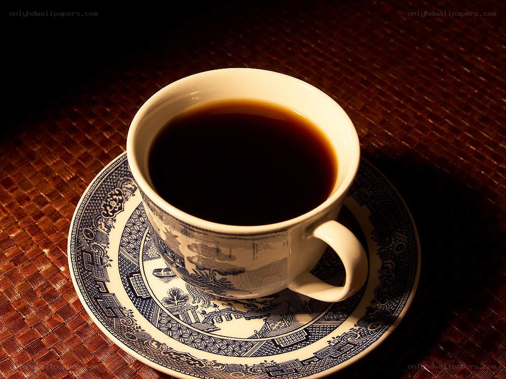 coffee cup on woven mat
