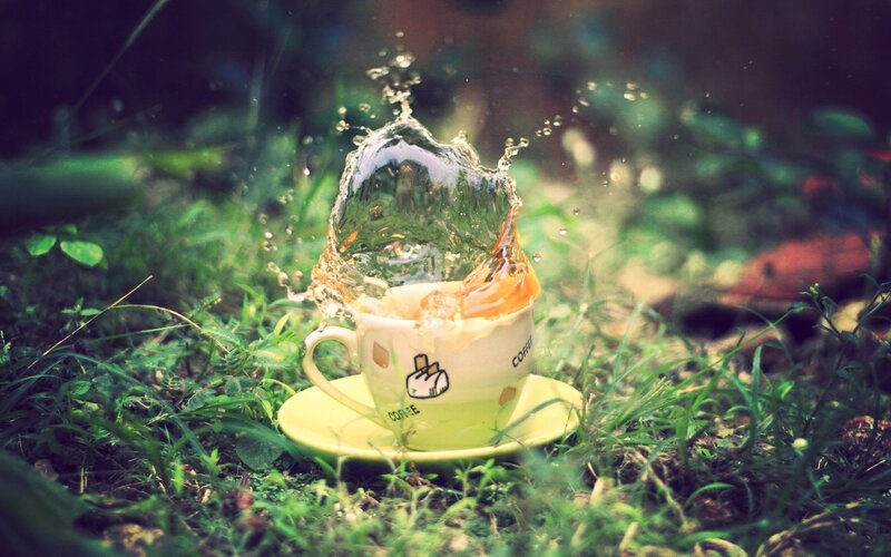 Coffee Cup Splashing Water