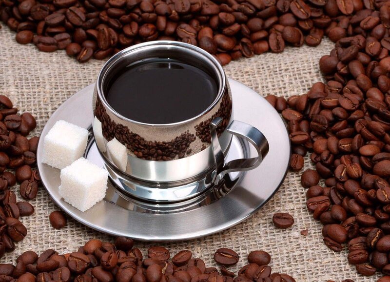coffee cup with beans and sugar