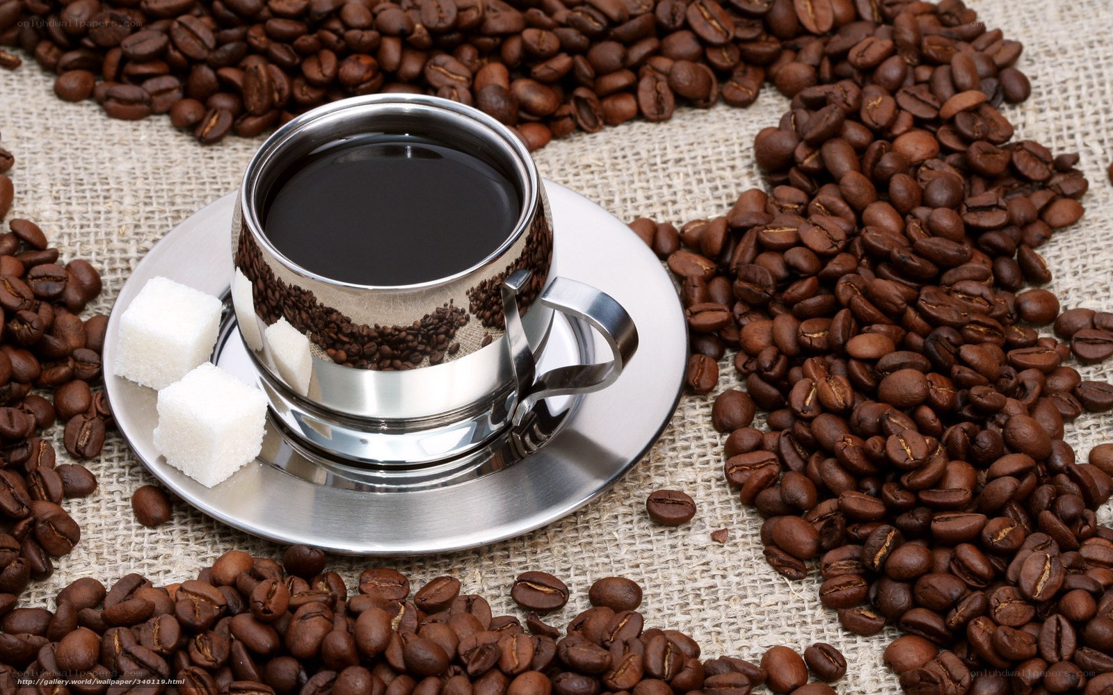 coffee cup with beans and sugar