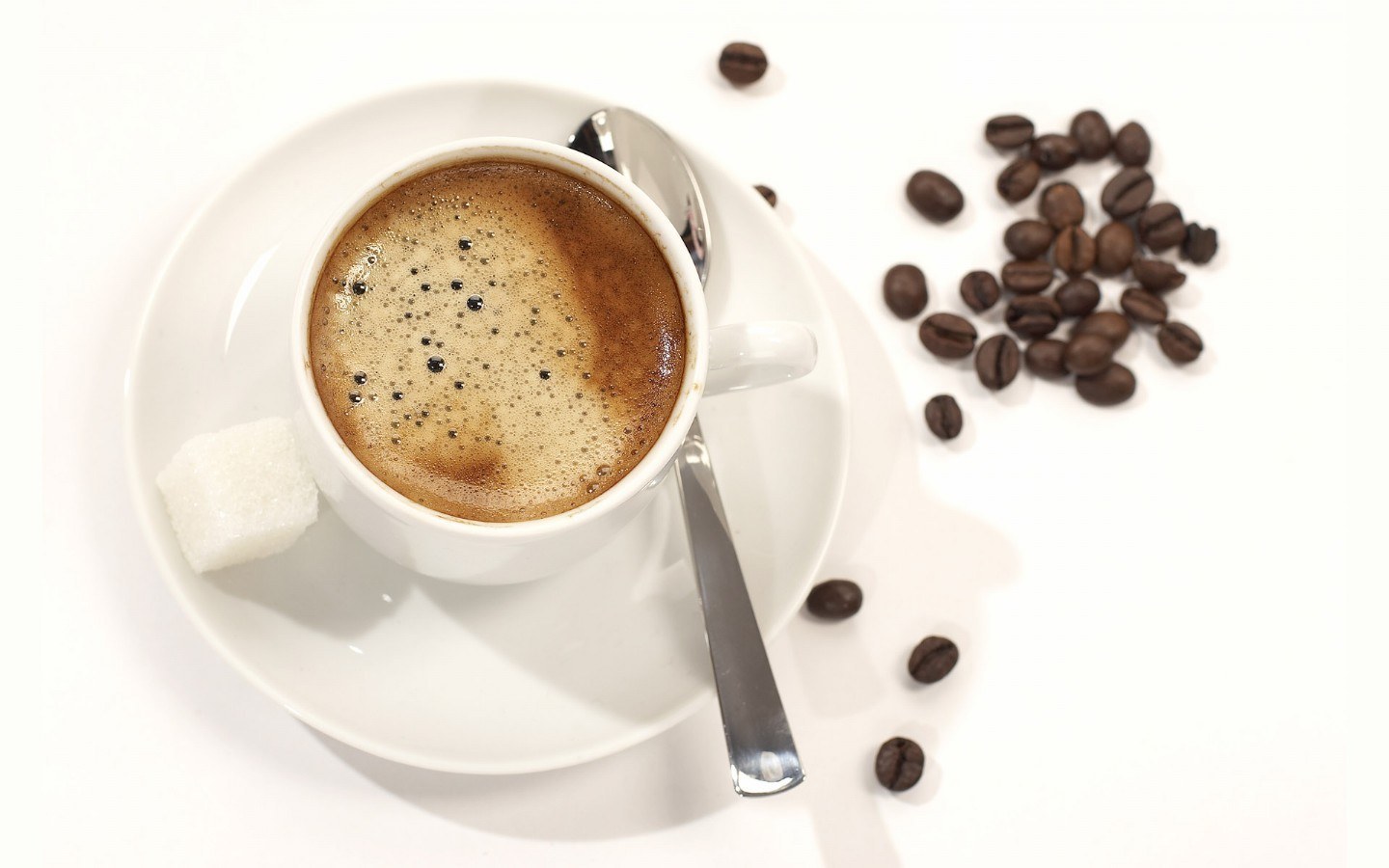 coffee cup with beans and sugar