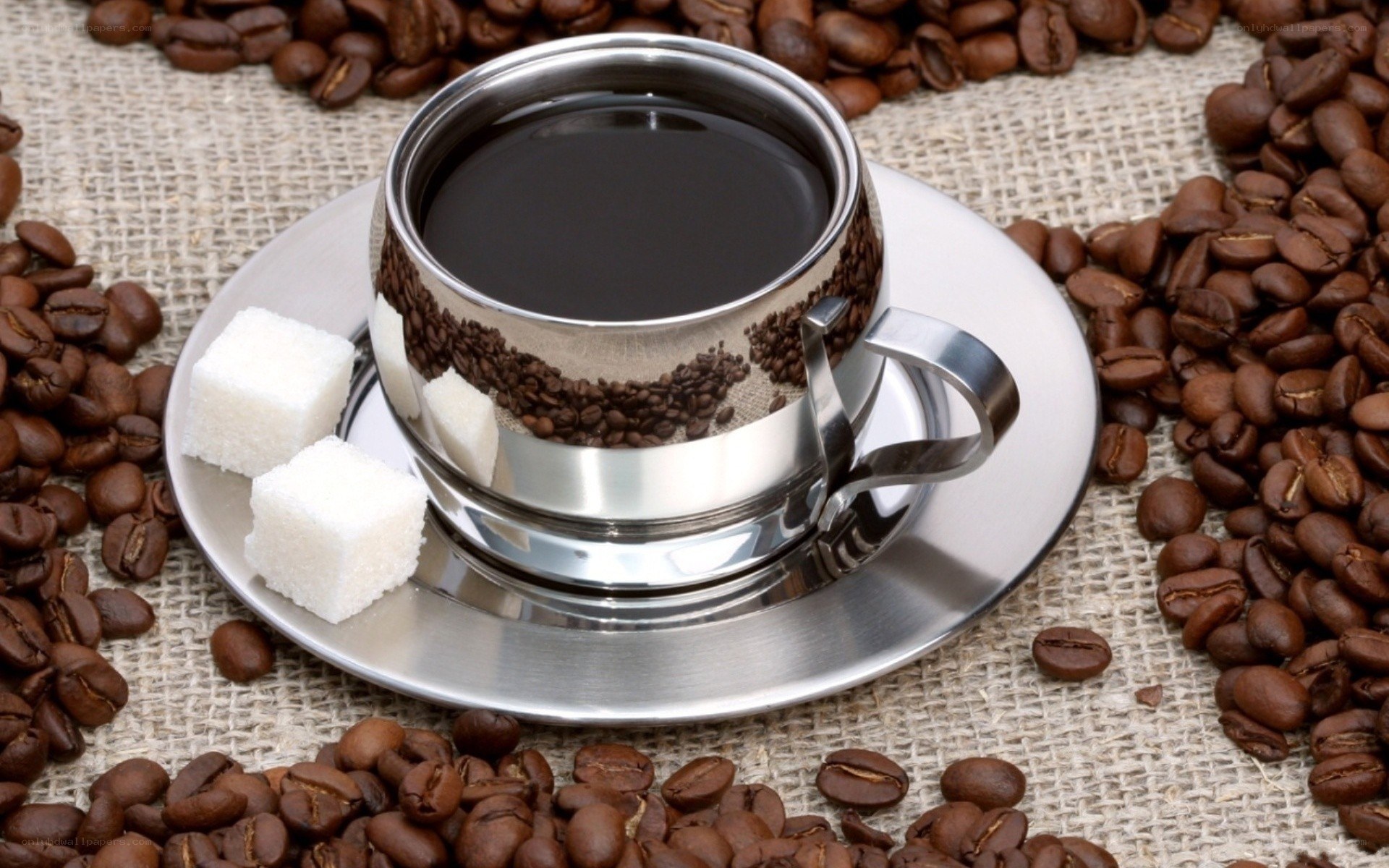 coffee cup with beans and sugar