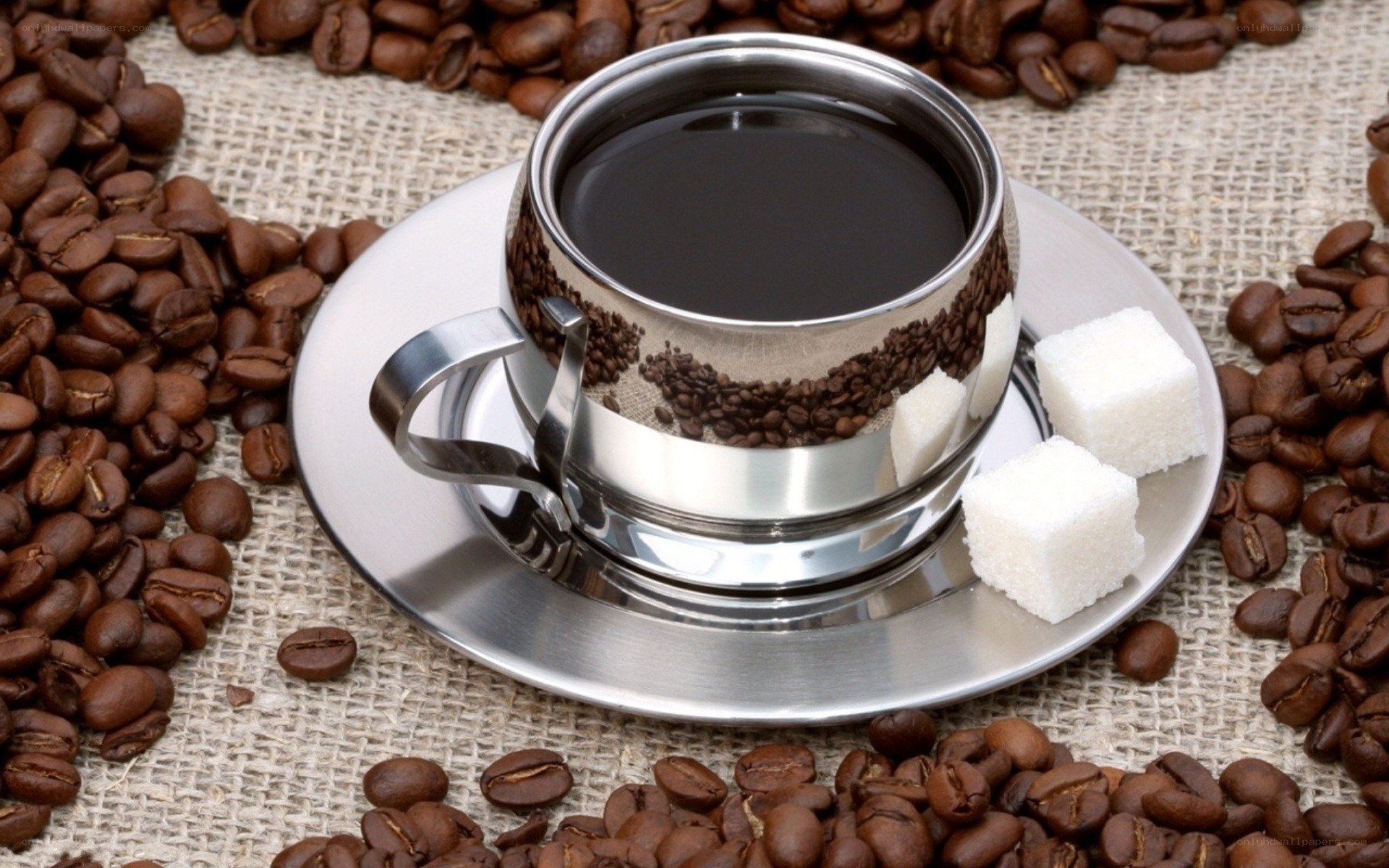 coffee cup with beans and sugar